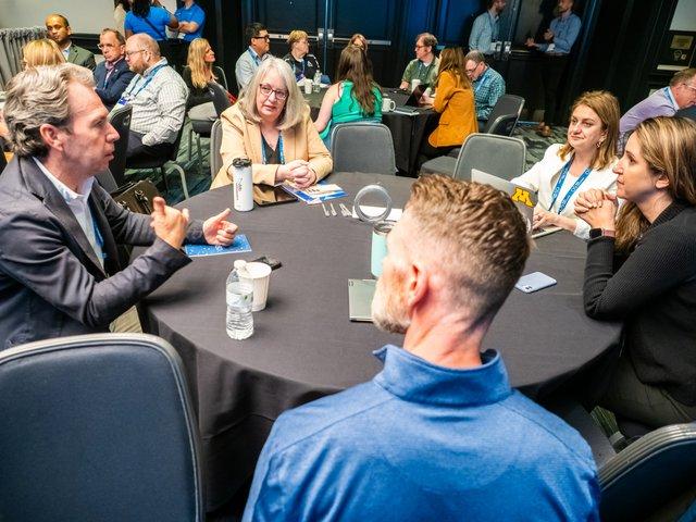 A small group discussion at Illuminate 2023