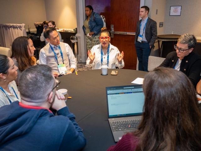 A small group discussion at Illuminate 2023
